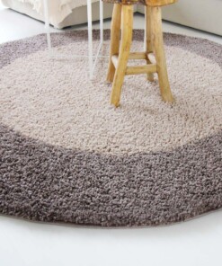 Tapis Rond poils longs avec Bordure Shaggy Trend - taupe - close up zijkant