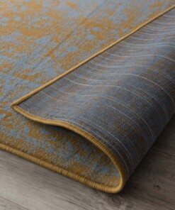 Tapis vintage orbis - or/gris - close up vouw